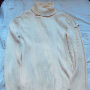 A Tommy Hilfiger white turtle neck :)